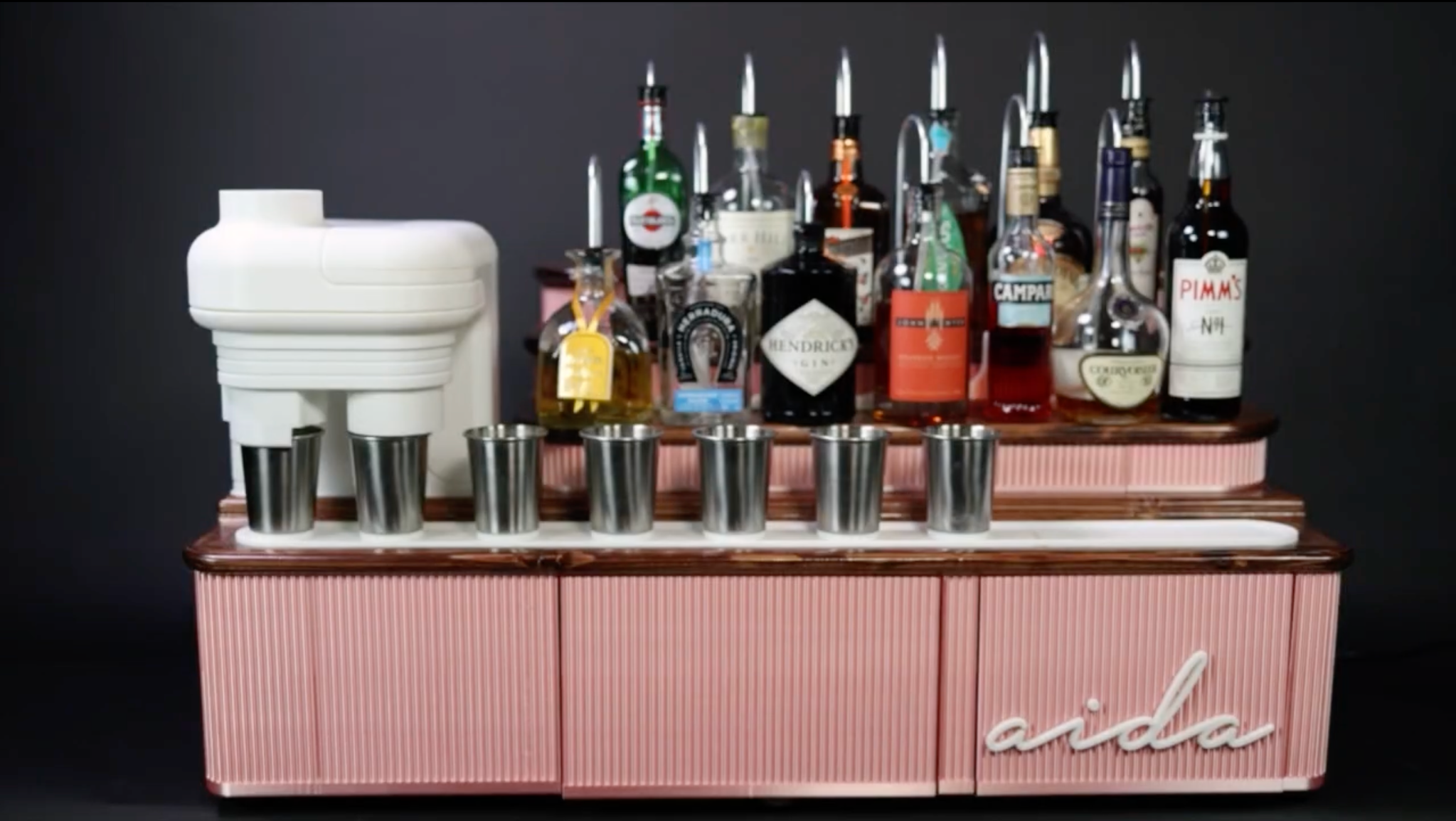 AIDA precision beverage system with bottles, tubes, cup dispenser and runway